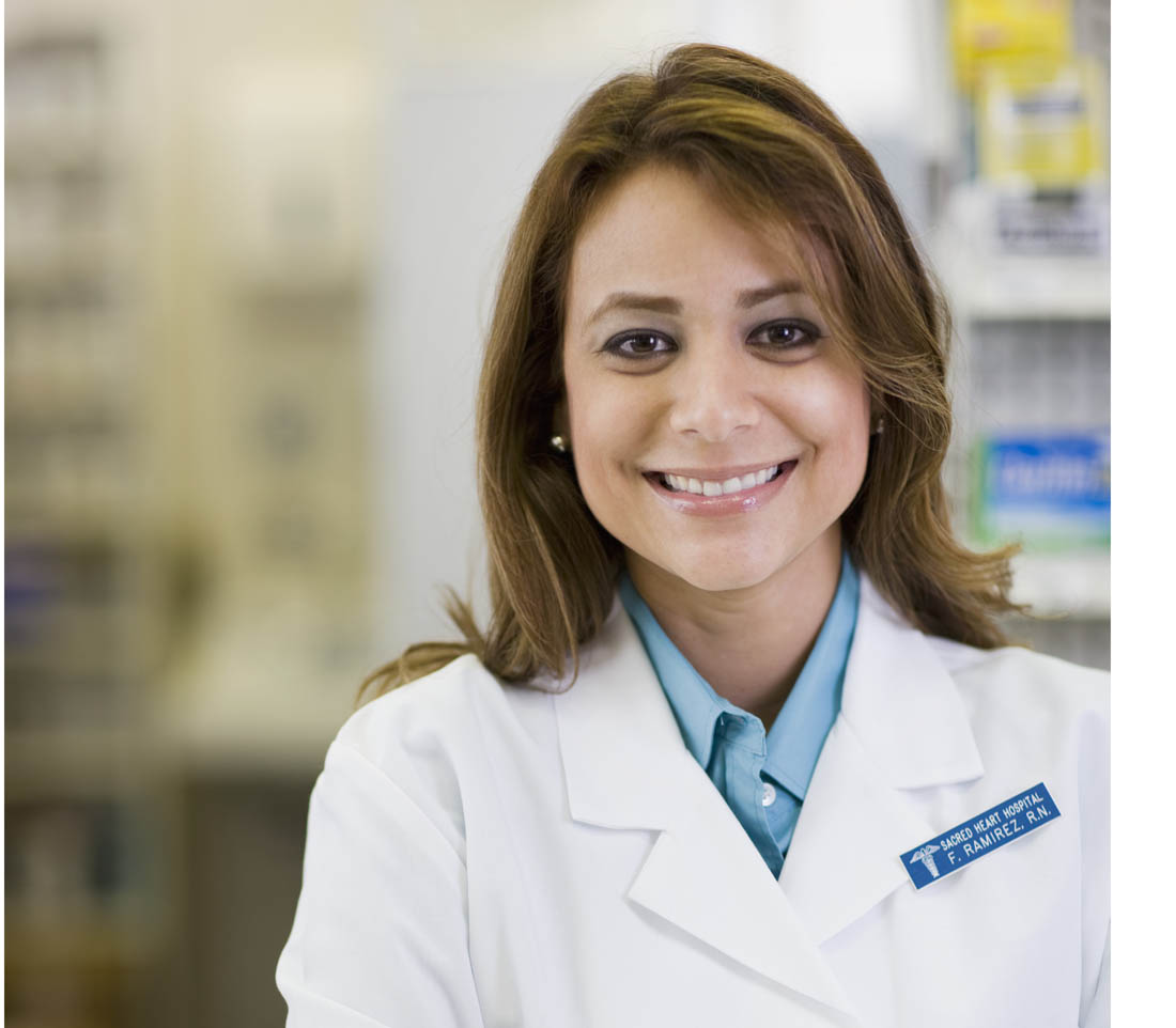 Smiling pharmacy technician